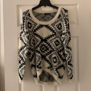 Black and cream sweater